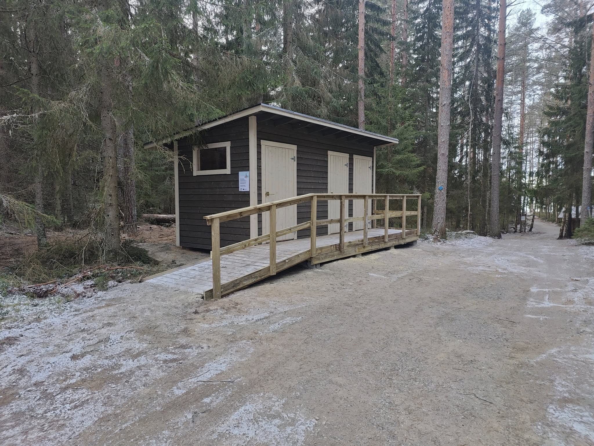 Accessible toilet. Access is via a ramp.